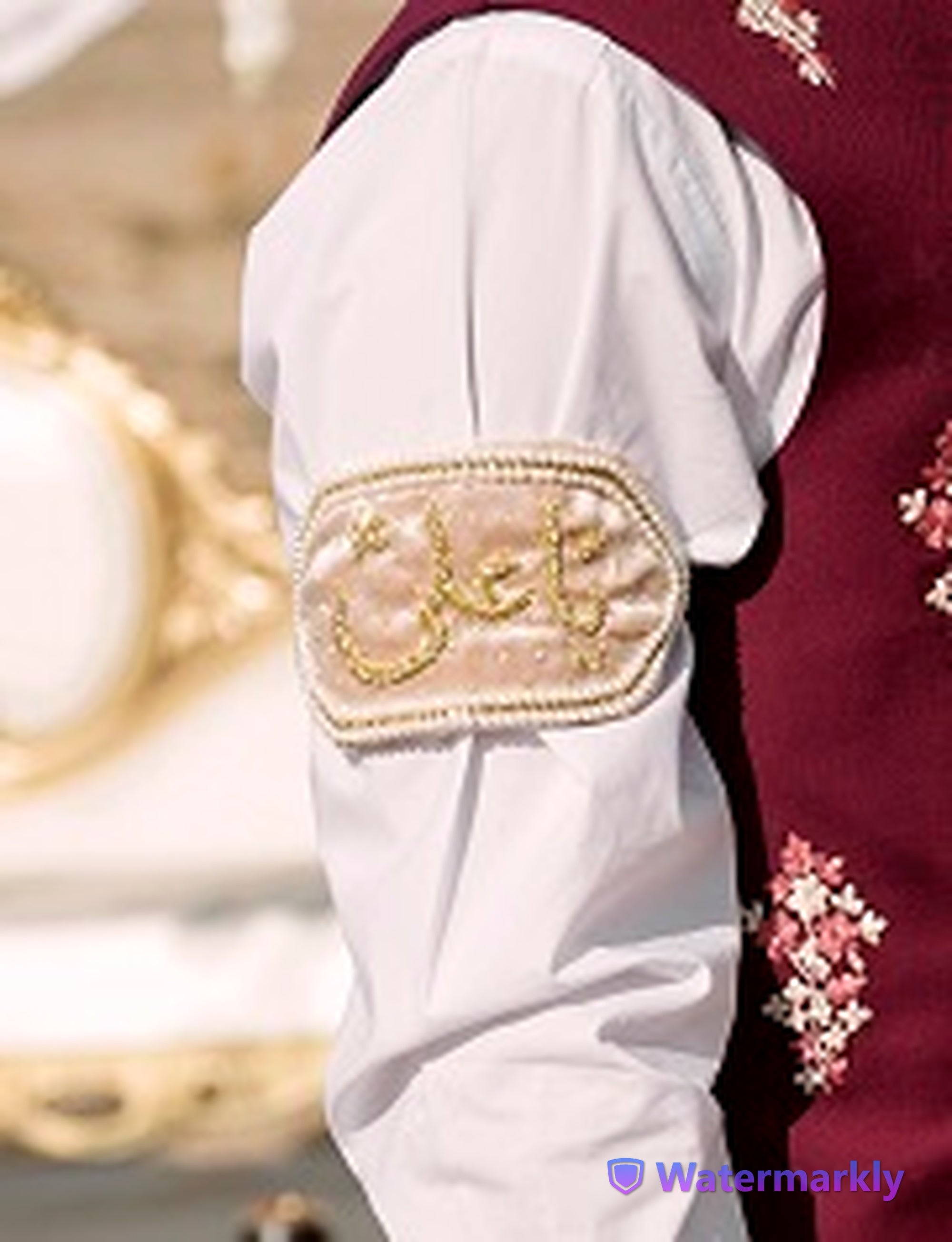 Groom proudly wearing a light pink Imam Zamin at Beridamad.com, embodying blessings and tradition in Muslim weddings.