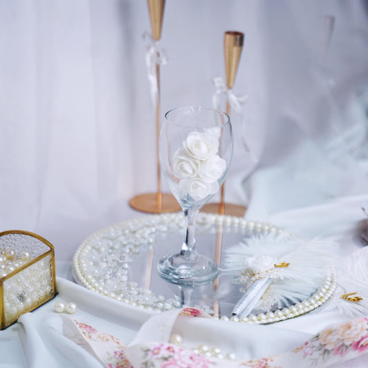 Graceful Dhood Pilai Glass with White Rose Accents